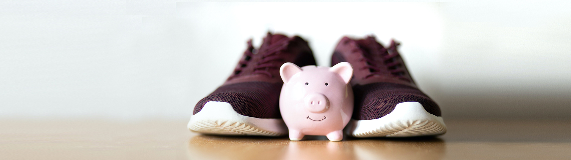 Piggy Bank next to shoes